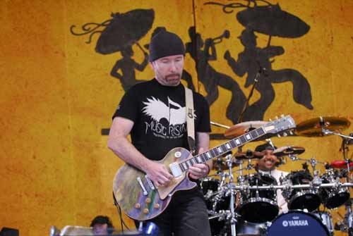 U2's The Edge plays at the very first New Orleans Jazz Fest & Music Festival for the first time after Hurricane Katrina